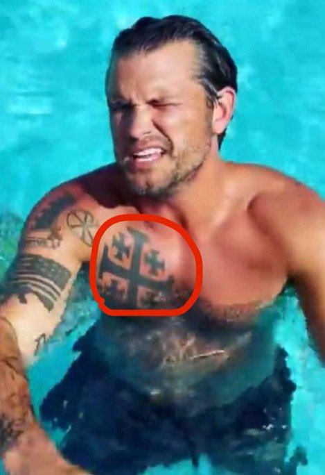 jerusalem cross tattoo'ed on the Secretary of
Defense/War